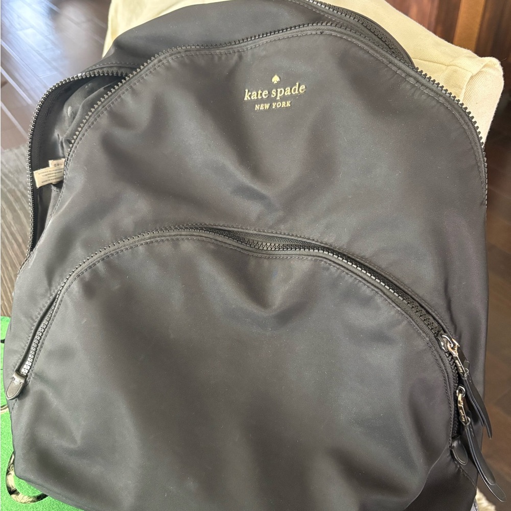 Kate Spade black nylon backpack with gold logo